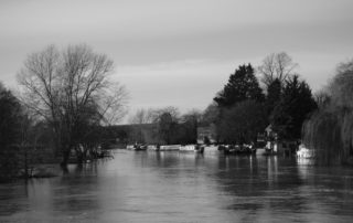 Flooded floating boats in Warwickshire, England