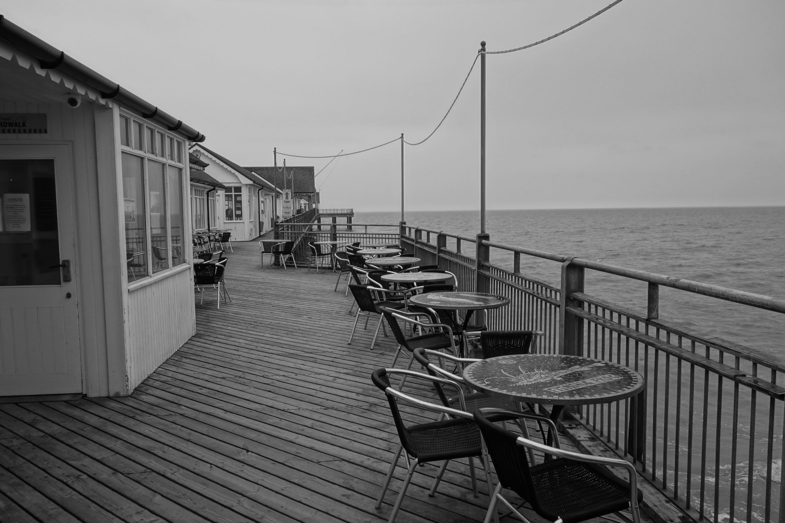 A set of tables on a pier in Suffolk, England